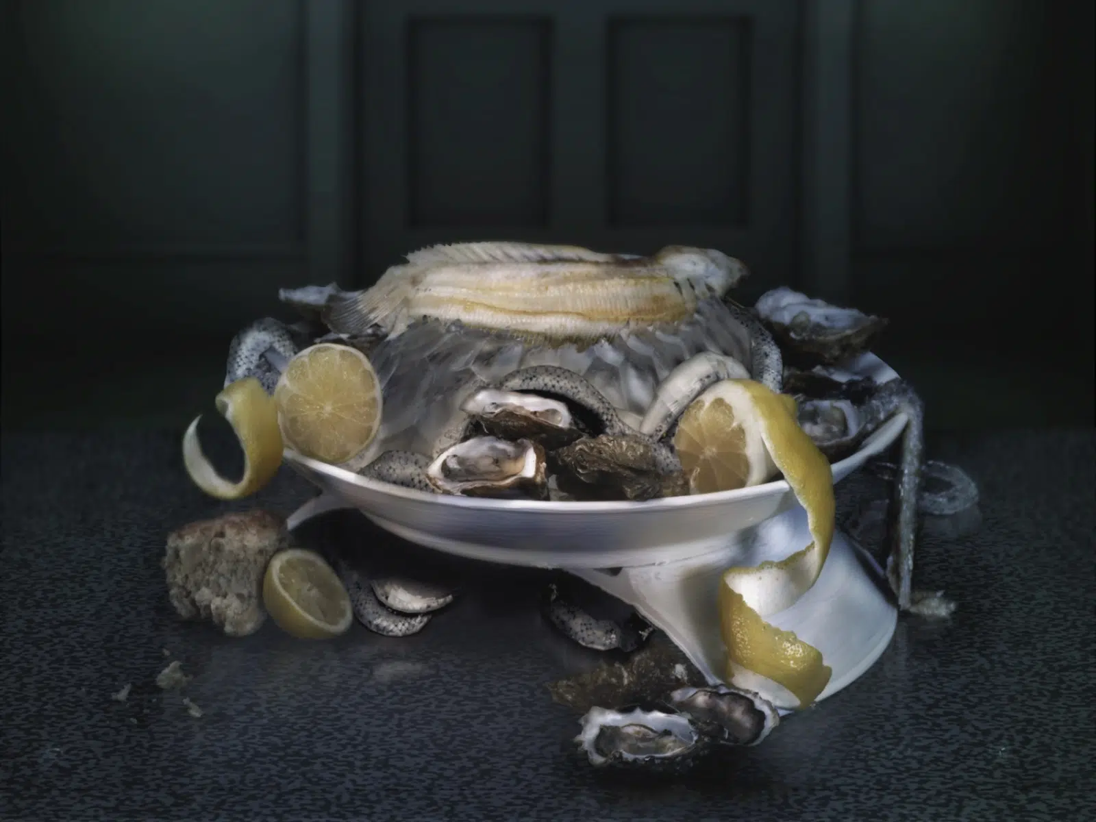 Still life of seafood, oysters, lemons, and fish on a plate, LAM Museum