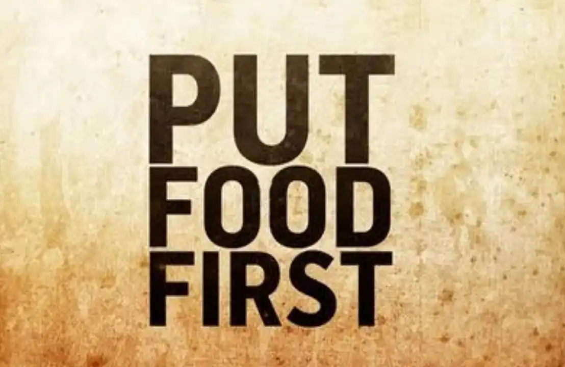 Text on a textured background reads "PUT FOOD FIRST.