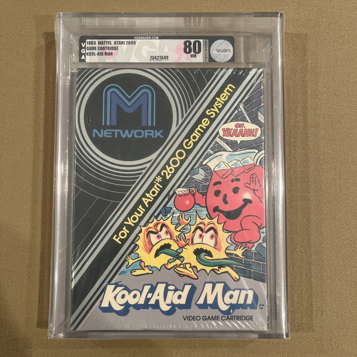 Graded Atari Kool-Aid Man game cartridge, VGA 80. Retro gaming!