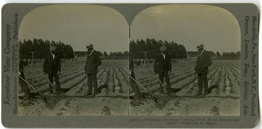 President Harding learning about irrigation in Idaho.