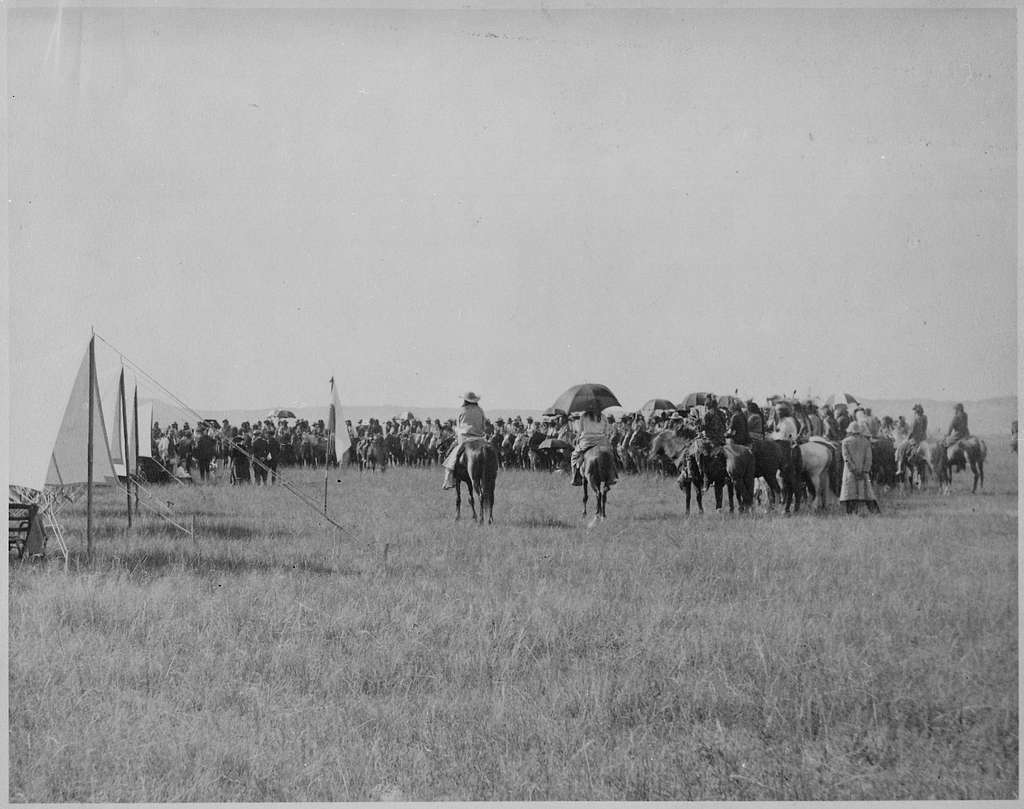 Chester A. Arthur at a cavalry encampment with tents and flags