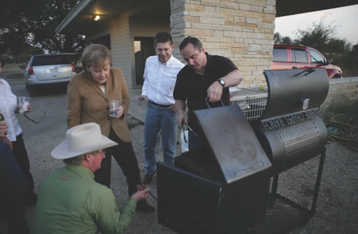 George W. Bush and Angela Merkel at a barbecue