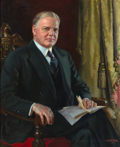 Official portrait of Herbert Hoover, 31st U.S. President, seated in a chair.