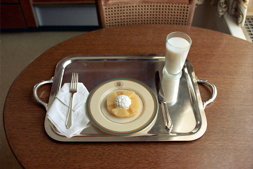 Richard Nixon's breakfast tray with pineapple, whipped cream, and milk