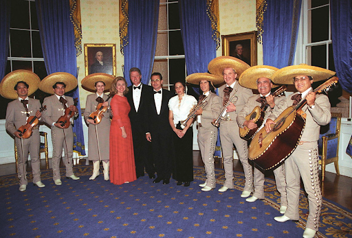 Bill Clinton and Hillary Clinton with mariachi band at the White House